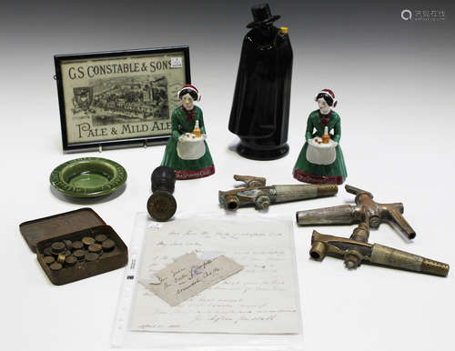 A small group of brewery related collectors' items, including two porcelain 'Sherry Girl' figures, a