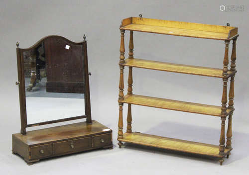 A 19th century mahogany swing frame toilet mirror, the base fitted with three drawers, on bracket