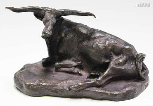 After Charles Marion Russell - a 20th century brown patinated cast bronze model of a Texas Longhorn,