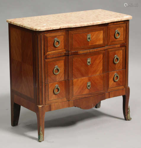 An early 20th century French Transitional style kingwood and marble topped commode, fitted with