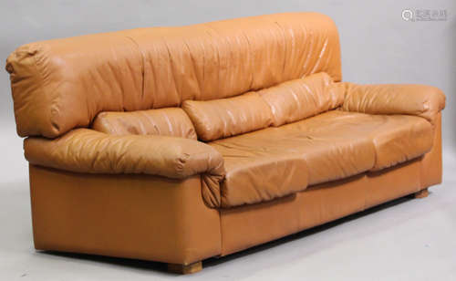 A pair of modern light brown leather sofas with removable cushions, on block feet, height 89cm,