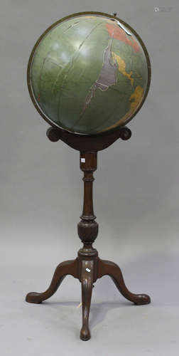 A 20th century floor standing terrestrial globe lamp by Georama Limited, diameter 48cm, raised on