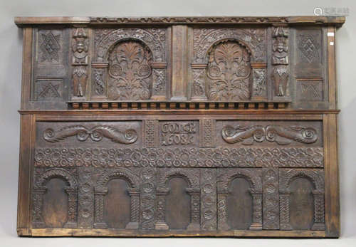 A large architectural oak wall panel, constructed from 17th and 18th century elements, the central