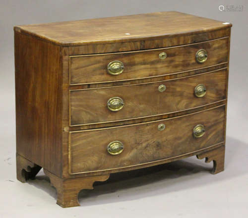 A late George III mahogany bowfront chest of three long drawers, on bracket feet, height 81cm, width