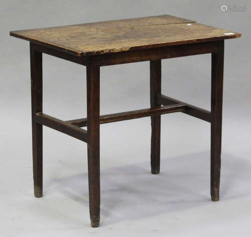 An 18th century Welsh oak rectangular centre table, on square tapering legs united by stretchers,