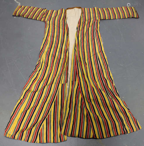 A Middle Eastern gentleman's gown of polychrome striped silk, length 141cm.Buyer’s Premium 29.4% (