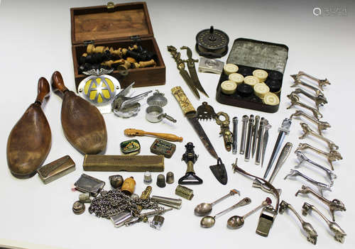 A mixed group of collectors' items, including an Intrepid Rimfly king size fishing reel, a pair of