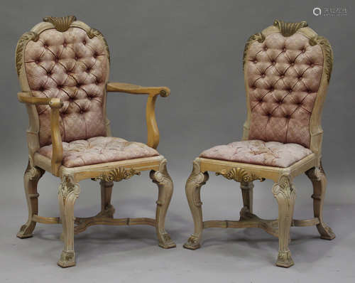 A set of eight 20th century French Rococo style bleached walnut dining chairs with gilded shell