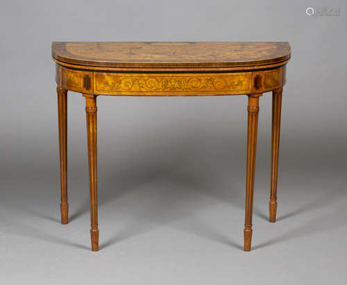 A late Victorian Neoclassical Revival satinwood fold-over card table, in the manner of Gillows,