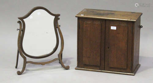 A Victorian oak hanging wall cabinet, fitted with a pair of panel doors, height 42cm, width 46cm,