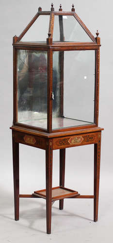 An Edwardian Neoclassical Revival satinwood display cabinet with painted decoration, the domed top