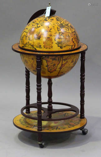 A 20th century novelty drinks cabinet in the form of a globe, height 94cm, diameter 50cm.Buyer’s