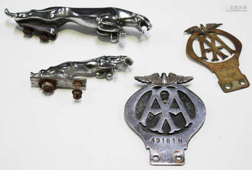 Two chromium plated Jaguar car mascots, an AA 'Cycle' member's badge, numbered '658317', and another