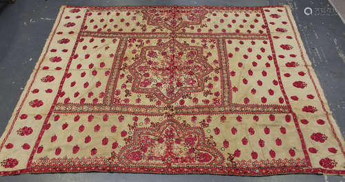 A 19th century Middle Eastern silkwork suzani, worked in red and black silks with flowers and