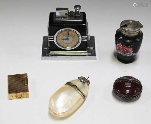 A Dupont Paris gilt metal rectangular gas lighter, a Ronson Touch-Tip Art Deco chrome plated desk