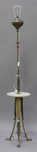 An Edwardian brass and onyx telescopic lamp standard with stiff leaf decoration, on paw feet, height