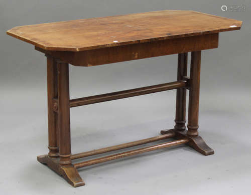 A late 19th/early 20th Century German walnut centre table, the crossbanded top above a single