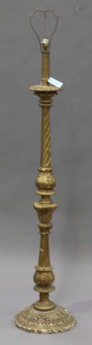 A 19th century giltwood and gesso lamp standard, the baluster column on a circular base, height