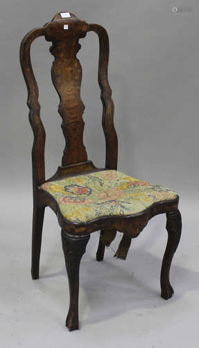 An 18th century Dutch marquetry side chair, the vase back inlaid with flowers above a tapestry seat,