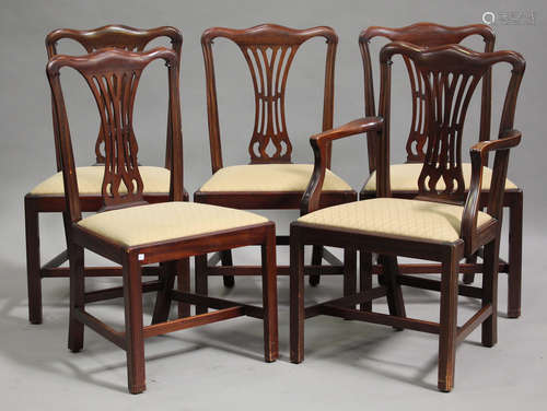 A set of five late 20th century George III style mahogany pierced splat back dining chairs with