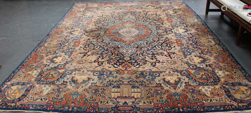 A large Tabriz carpet, Central Persia, mid-20th century, the blue field with a large foliate