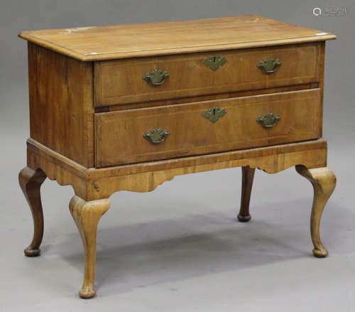 A George III walnut chest of two long drawers raised, on cabriole legs, height 81cm, width 98cm,