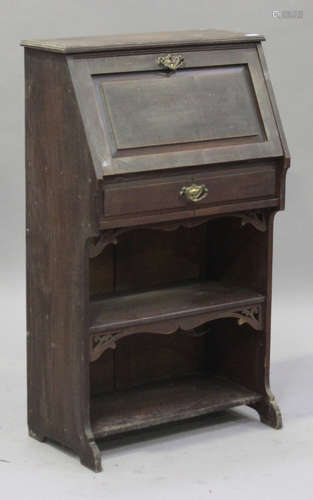 A George V oak student's bureau, the fall front above a drawer and open shelf, height 113cm, width