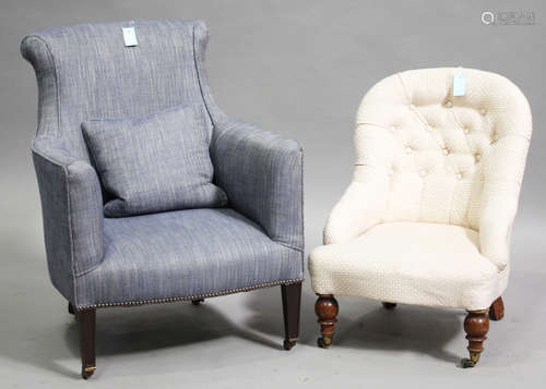 An Edwardian armchair, upholstered in blue fabric, on square tapering legs, height 89cm, width 69cm,