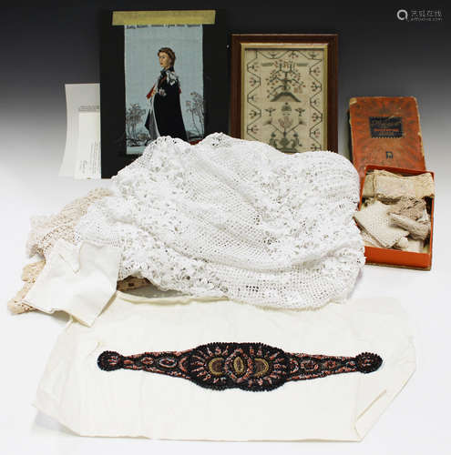 A small group of textiles, including a small Victorian sampler, a 1977 silver jubilee woven silk