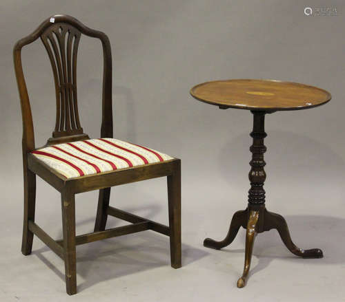 An Edwardian mahogany circular wine table with chequer stringing, on a turned column and tripod