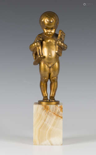 Eugene Wagner - an early 20th century German gilded cast bronze figure of a standing infant boy