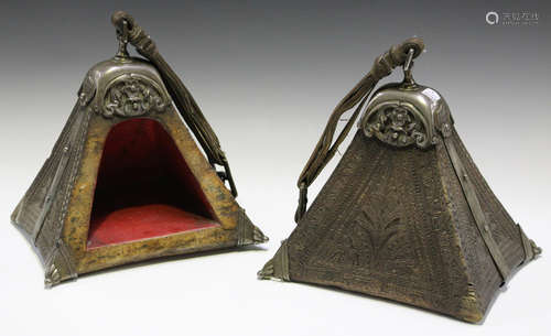 A pair of late 19th/early 20th century Peruvian carved walnut and nickel mounted stirrups of