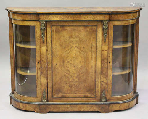 A mid-Victorian walnut and inlaid credenza with gilt metal mounts, the central panel cupboard