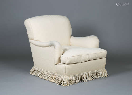 A modern Howard Chairs Ltd 'Bridgewater' armchair, the scroll back and arms upholstered in cream