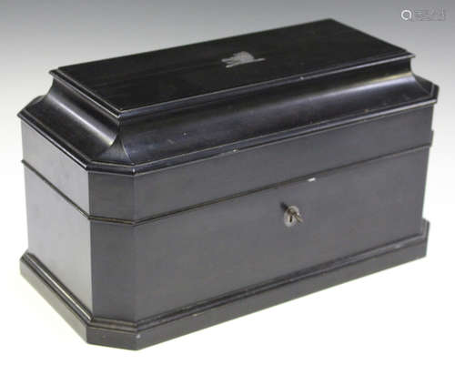 An early Victorian ebony and silver mounted tea caddy, the pagoda moulded lid inlaid with a silver