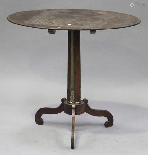 A Regency rosewood oval tip-top wine table with brass fluted column and gilt metal mounts, on tripod