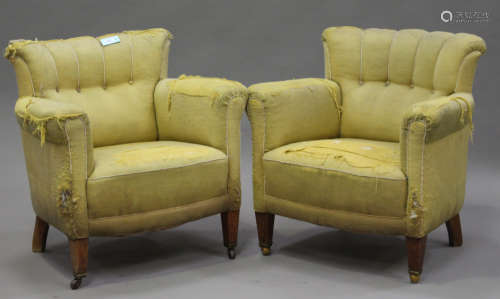 A pair of Edwardian tub back armchairs, upholstered in yellow fabric, on square tapering legs and