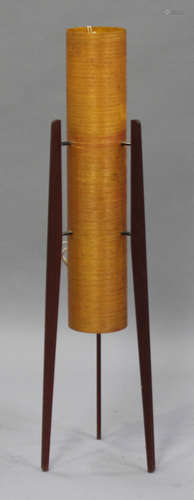 A mid-20th century teak and amber fibreglass floor lamp of rocket form, height 112cm.Buyer’s Premium