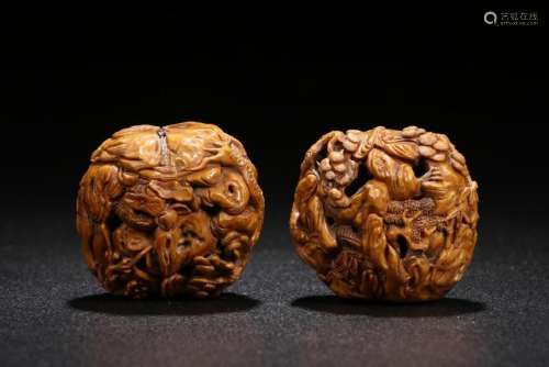 Pair Of Carved Scholor Walnuts