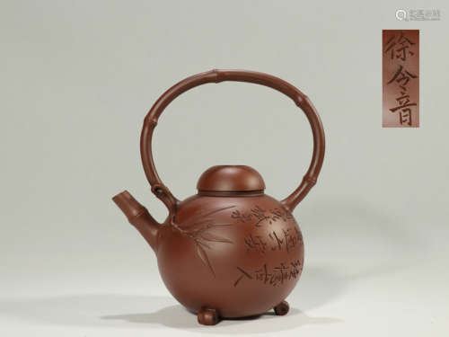 A Chinese Yixing Clay Loop-Handled Pot