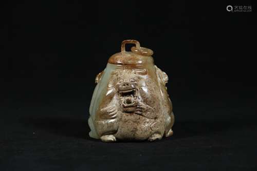 A Chinese Carved Jade Jar with Foo-Dog Pattern