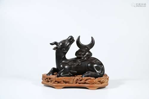 A Chinese Carved Zitan Rhinoceros