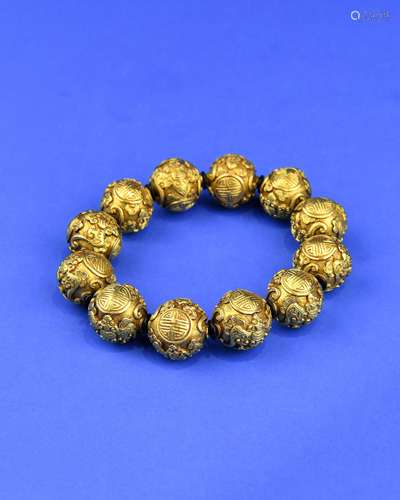 A Chinese Carved Gold Bracelet