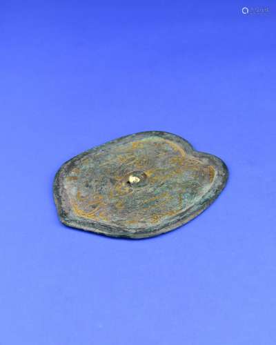 A Chinese Bronze Mirror with Gold Inlaided