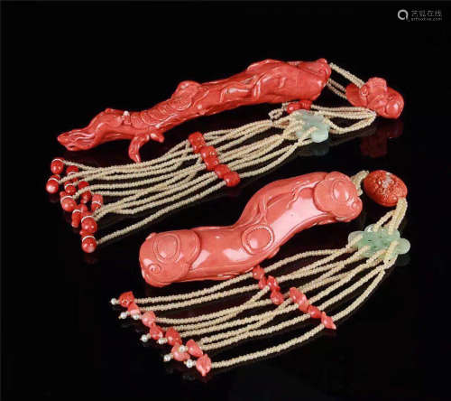 A PAIR OF CORAL RUYI PENDANTS