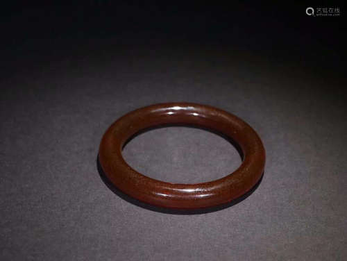 AN OLD AMBER BANGLE