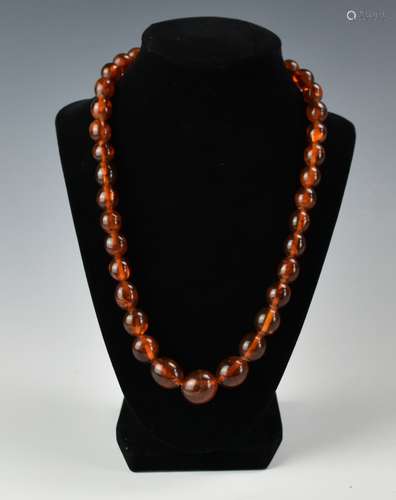 An Antique Amber 38 Bead Necklace