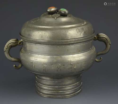 A Pewter Xi Vessel