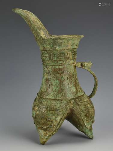 An Antique Bronze Tripod Wine Pot