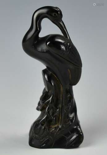 A Chinese Black Amber Sculptured Crane